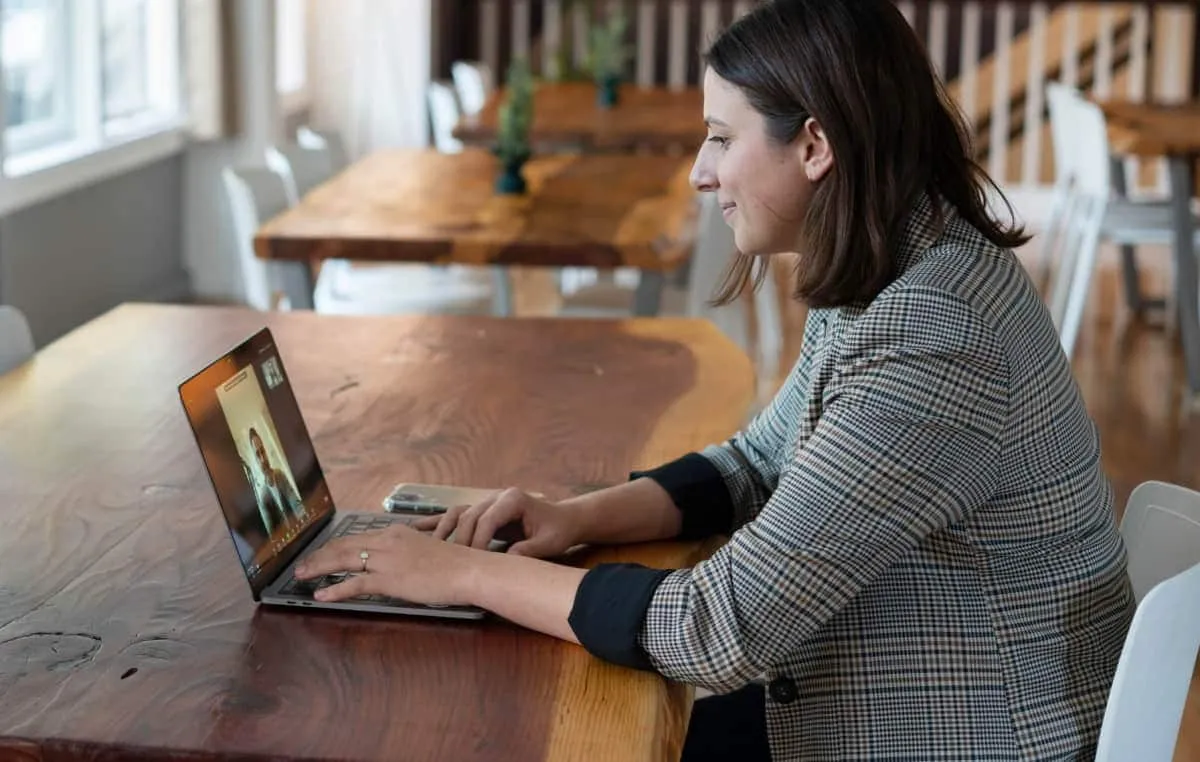 Professional taking part in a video interview on a laptop