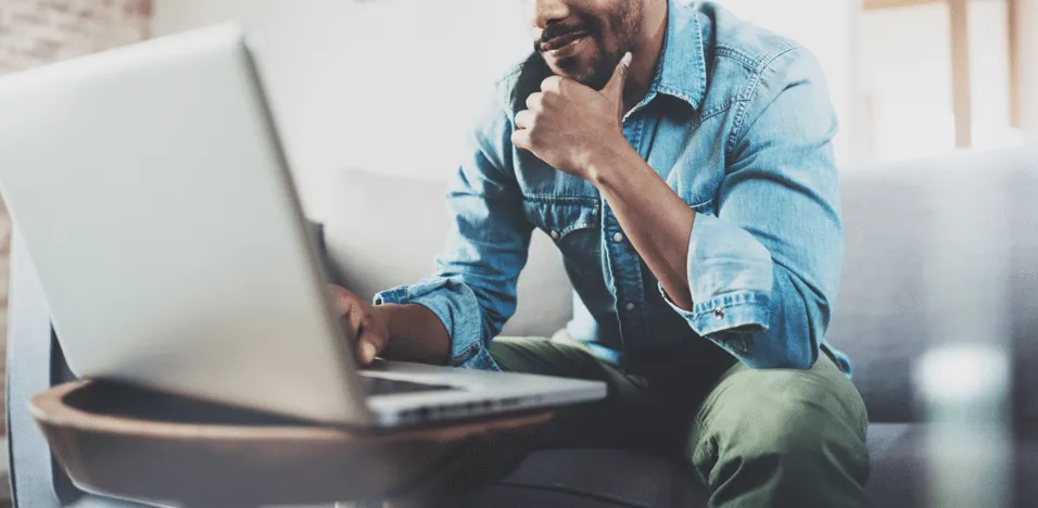 Person using a laptop at home