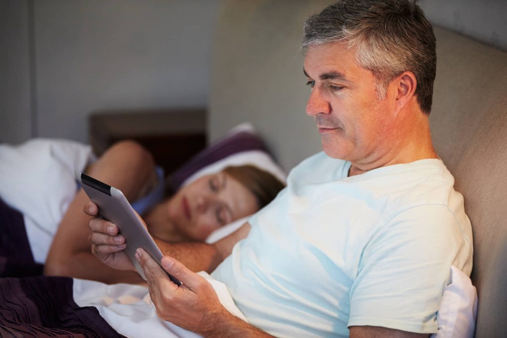 Reader browsing digital news on a tablet